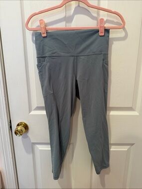 Athleta Salutation Stash Pocket II 7/8 Tight size M